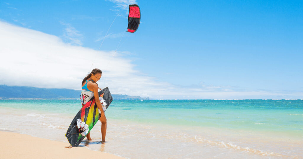 Kite surfers at Cabarete Beach enjoying wind and waves, a favorite adventure spot in places to visit in Dominican Republic