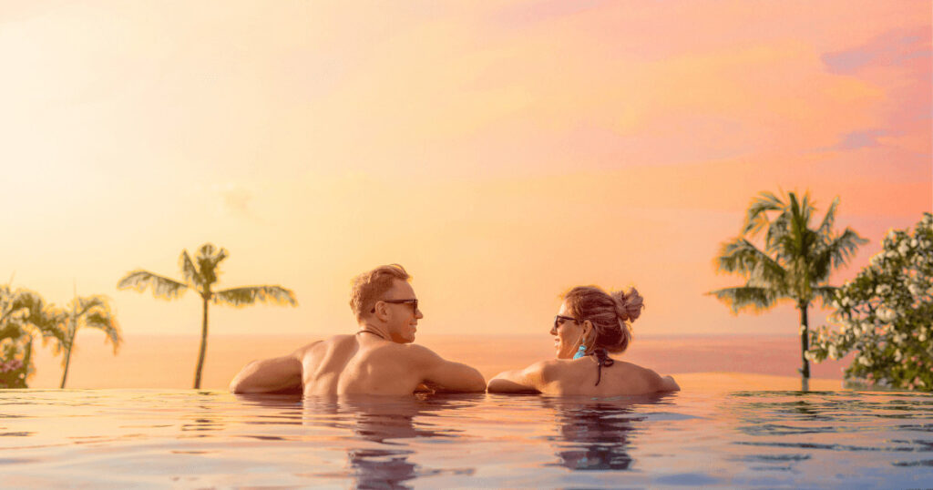 Luxury hotels in Egypt – romantic sunrise moment over the Nile River captured by a couple.