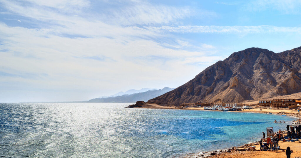 Couple snorkeling in Dahab during romantic honeymoon Egypt coastal getaway