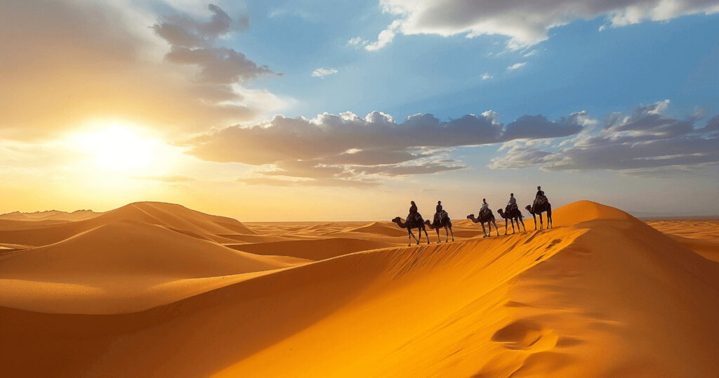 Romantic honeymoon Egypt camel ride across golden dunes at sunset