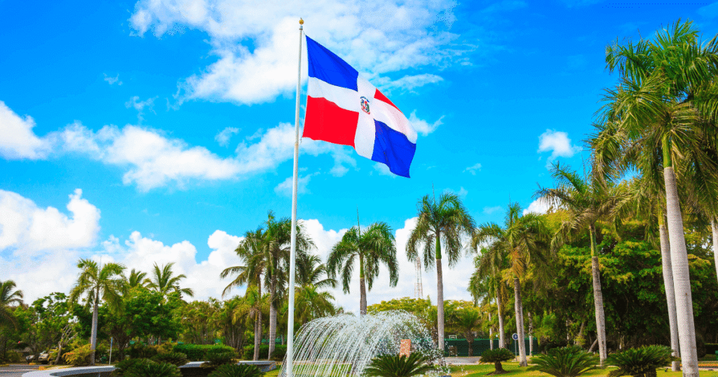 Dominican Republic flag overlooking the ocean symbolizing culture and national identity