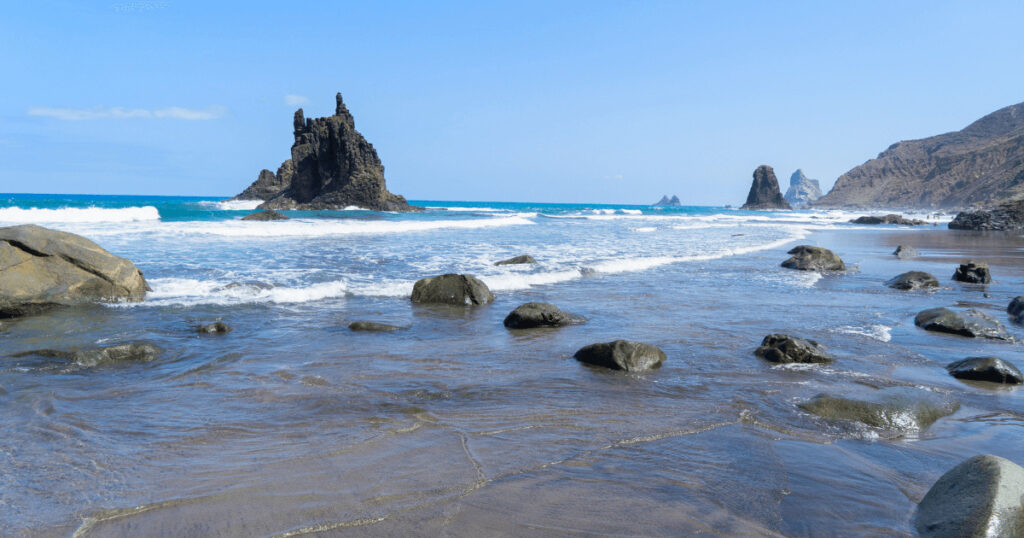 Playa Frontón one of the most beautiful hidden beaches in the Dominican Republic surrounded by dramatic cliffs